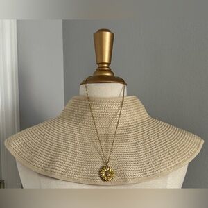 New with tags! Roll-up Straw Hat with velcrow bow!